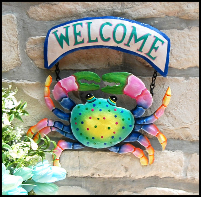 Hand painted metal crab welcome sign. 